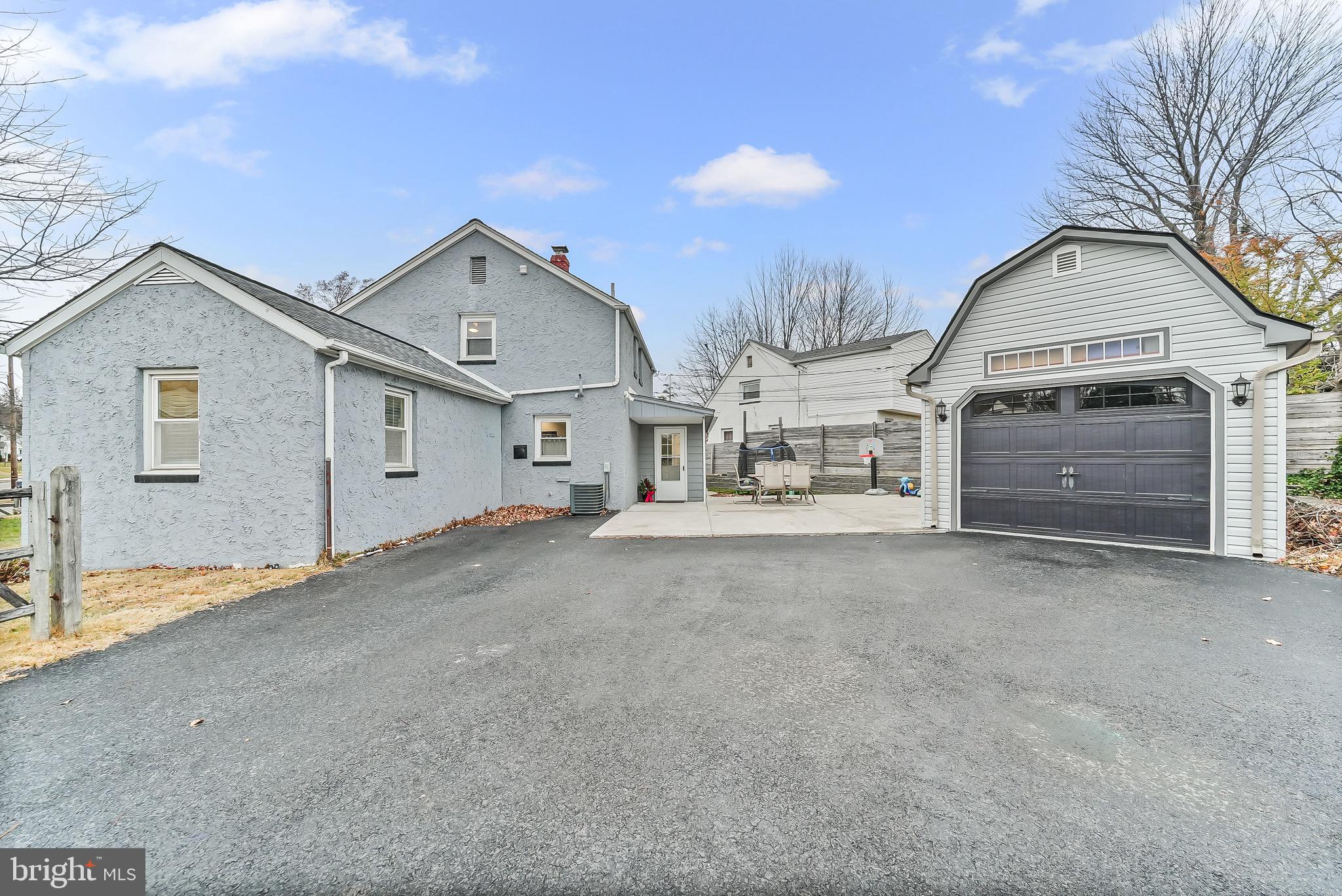 2330 Poe Road Secane, PA 19018 - Photo 29 of 33 a view of a house with a outdoor space and a yard