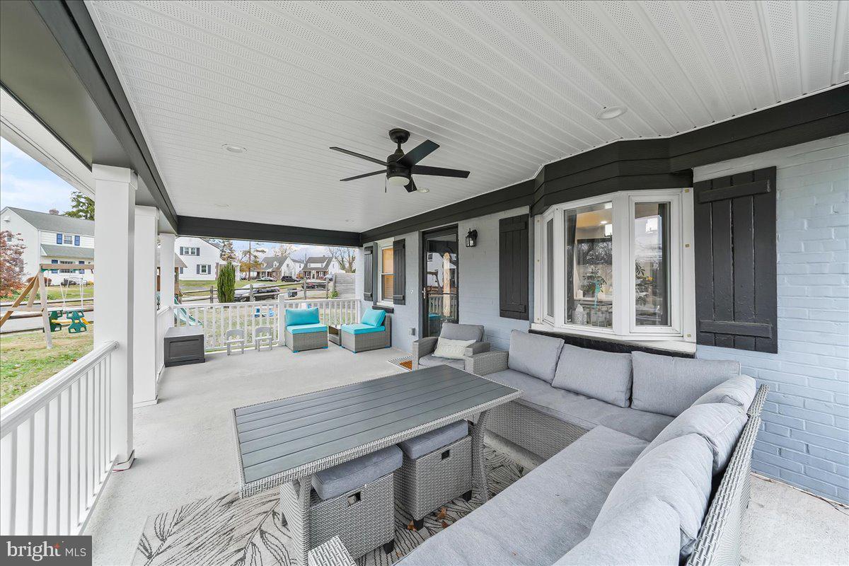 2330 Poe Road Secane, PA 19018 - Photo 5 of 33 a living room with furniture and a large window