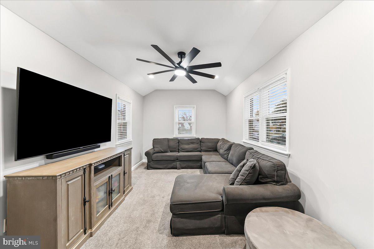 2330 Poe Road Secane, PA 19018 - Photo 8 of 33 a living room with furniture and a flat screen tv