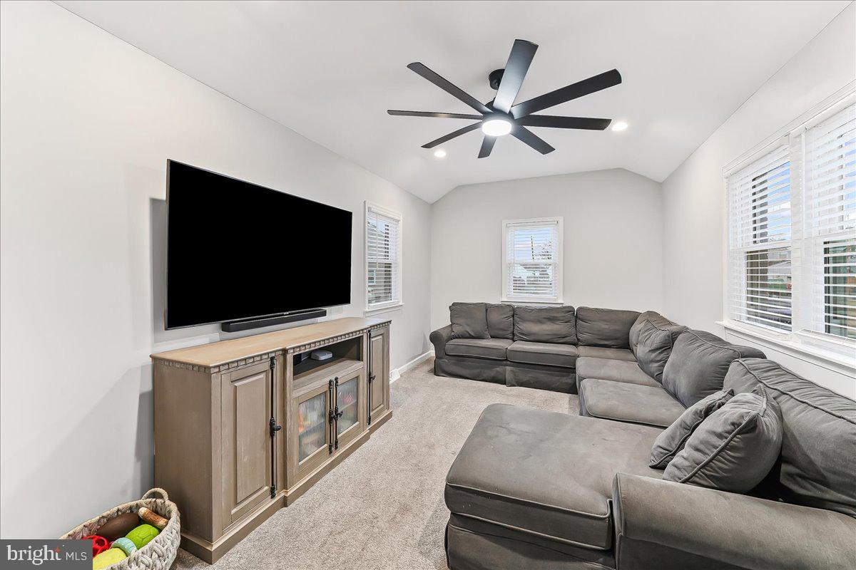2330 Poe Road Secane, PA 19018 - Photo 9 of 33 a living room with furniture and a flat screen tv