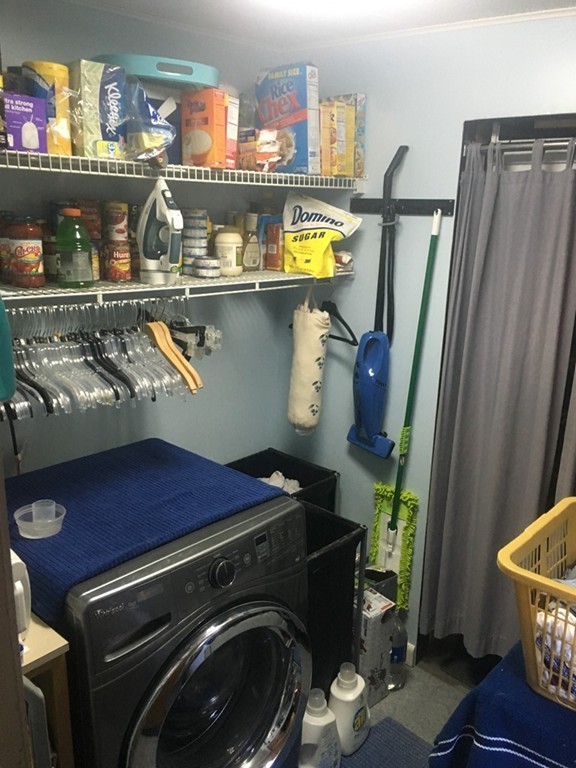137 Vincent Street Springfield, MA 01129 - Photo 17 of 24 a room with storage and utility