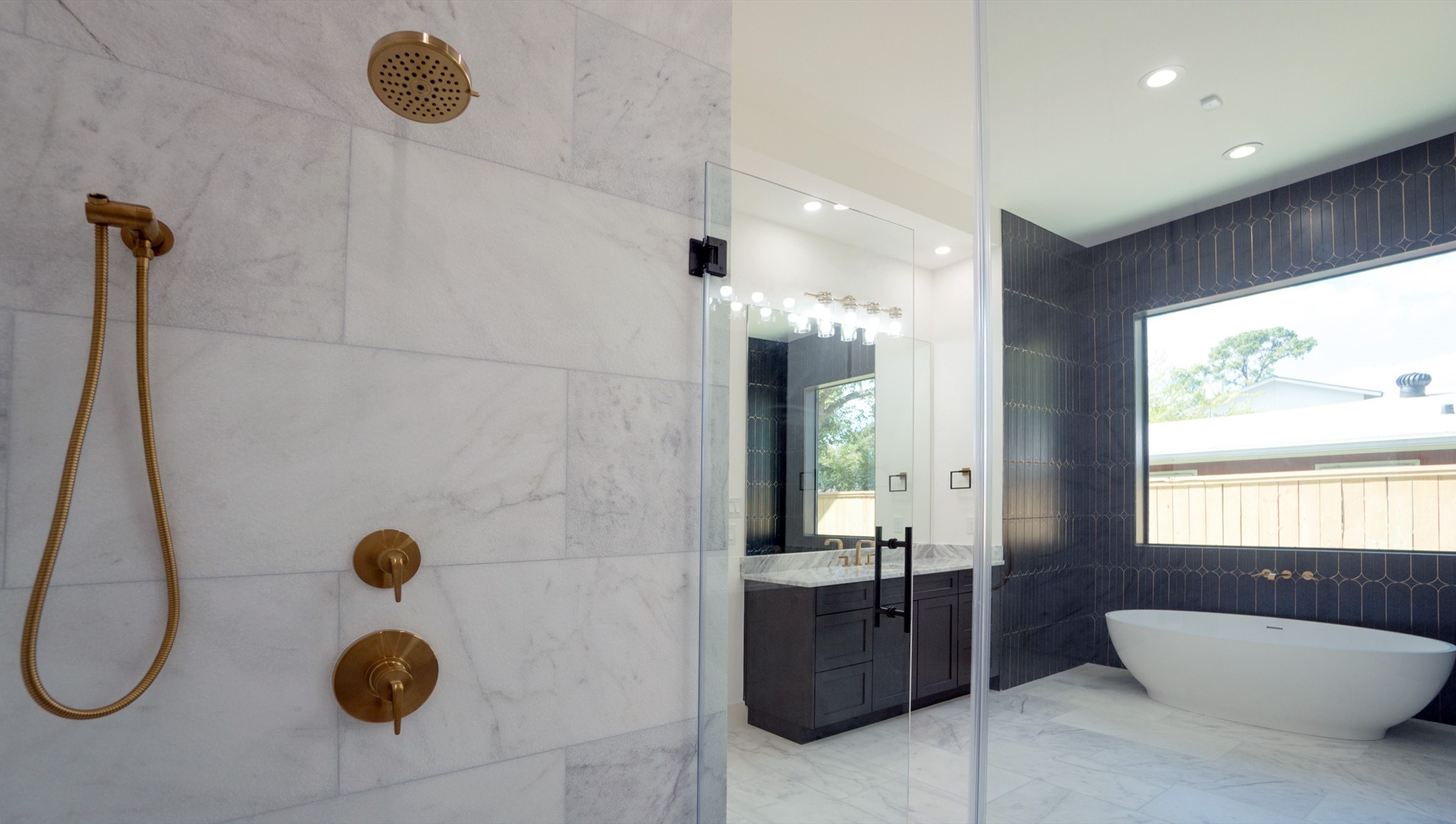 9345 Leto Road Houston, TX 77080 - Photo 20 of 27 a bathroom with a sink and a shower