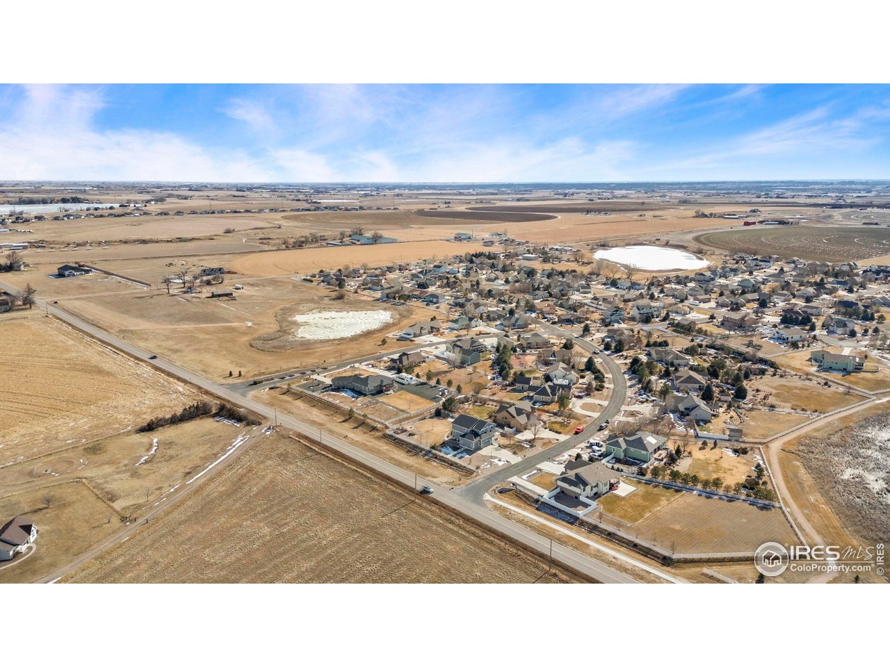1302 Park Ridge Drive Severance, CO 80615 - Photo 33 of 35 a view of an ocean and beach