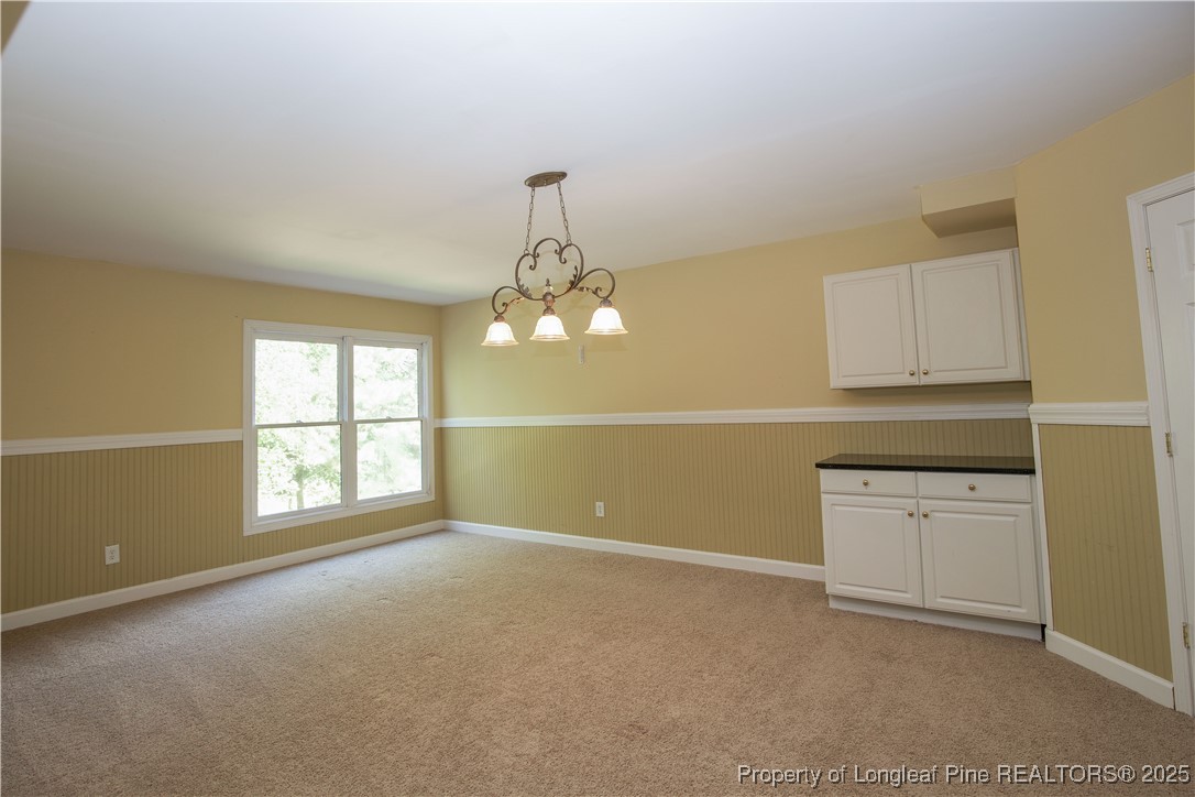 175 Knoll Road Southern Pines, NC 28387 - Photo 43 of 50 a view of an empty room with a window