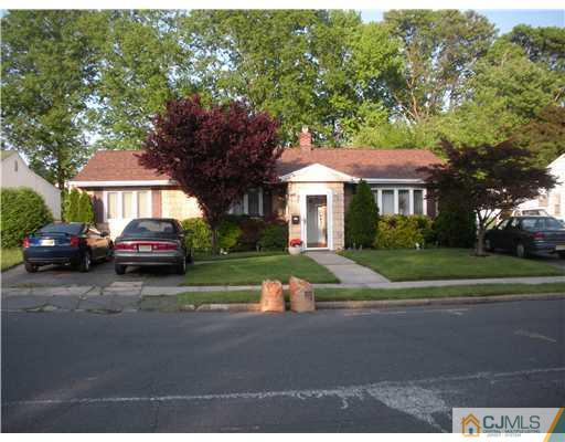 43 Cambridge Road Edison, NJ 08817 - Photo 1 of 21 a house view with a garden space