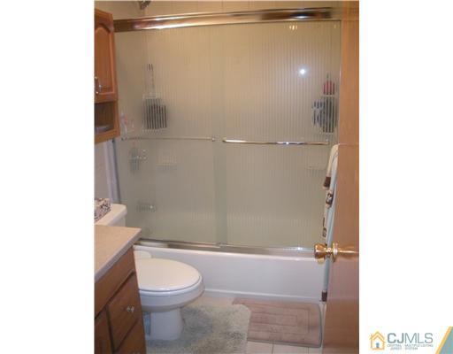 43 Cambridge Road Edison, NJ 08817 - Photo 17 of 21 a bathroom with a toilet and a shower