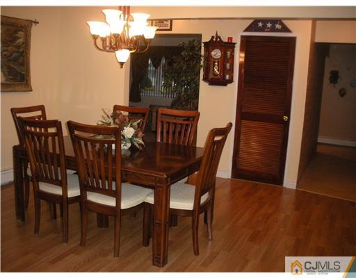43 Cambridge Road Edison, NJ 08817 - Photo 6 of 21 a view of a dining room with furniture and wooden floor