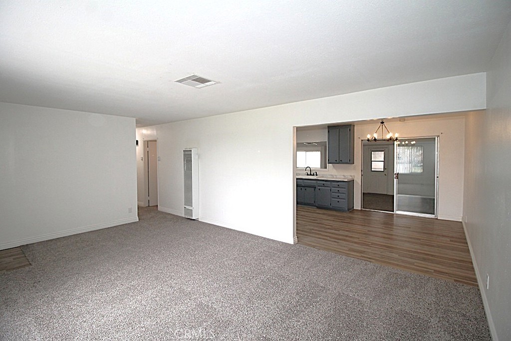 700 Arbor Way Barstow, CA 92311 - Photo 9 of 37 a view of empty room with wooden floor