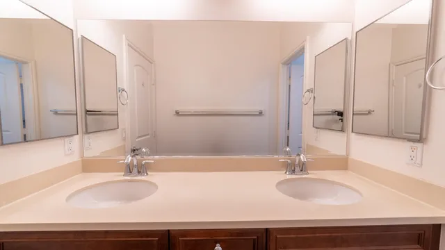 an empty room with a ceiling fan