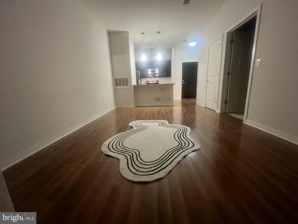 a kitchen with stainless steel appliances granite countertop a sink and a stove top oven