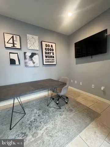 a view of a livingroom with a ceiling fan