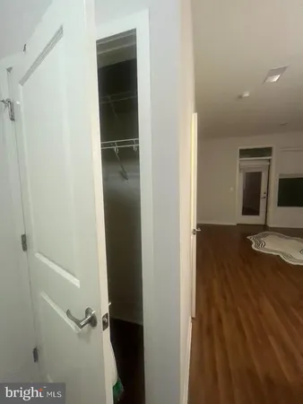 a kitchen with a refrigerator and a stove