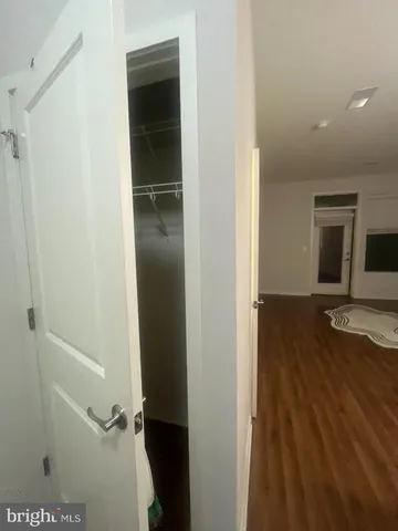 a kitchen with a refrigerator and a stove