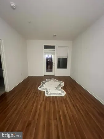 a bathroom with a sink toilet and mirror