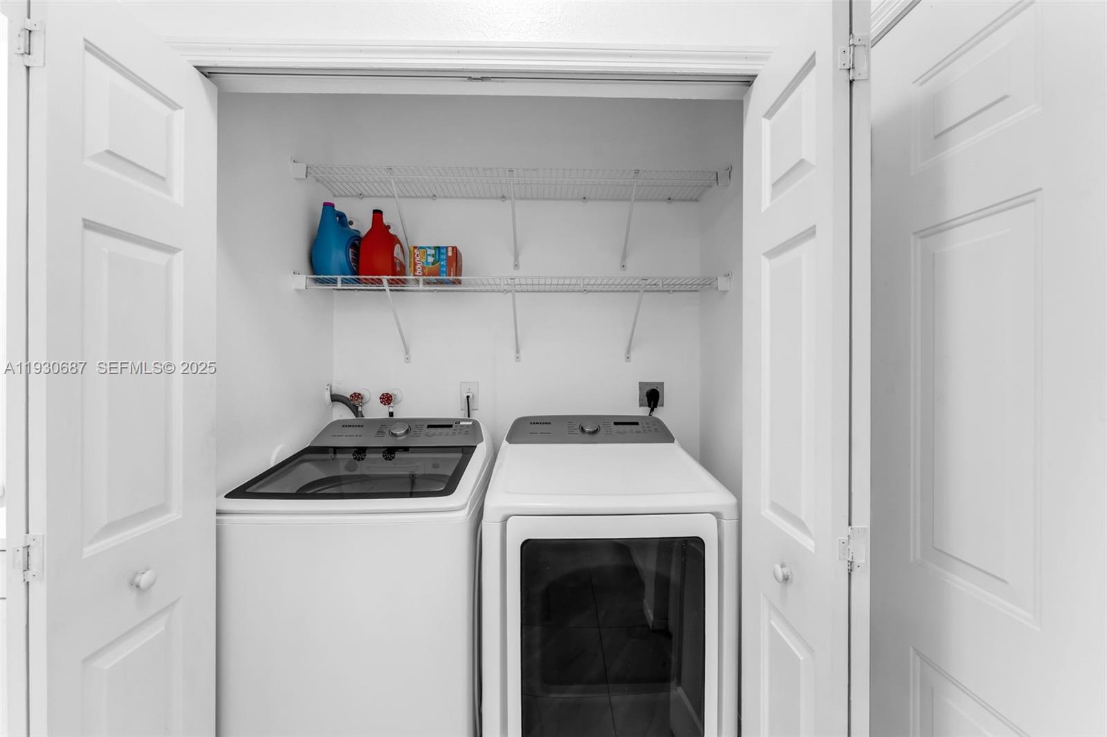 13820 Southwest 275th Street Homestead, FL 33032 - Photo 12 of 36 a utility room with dryer and washer
