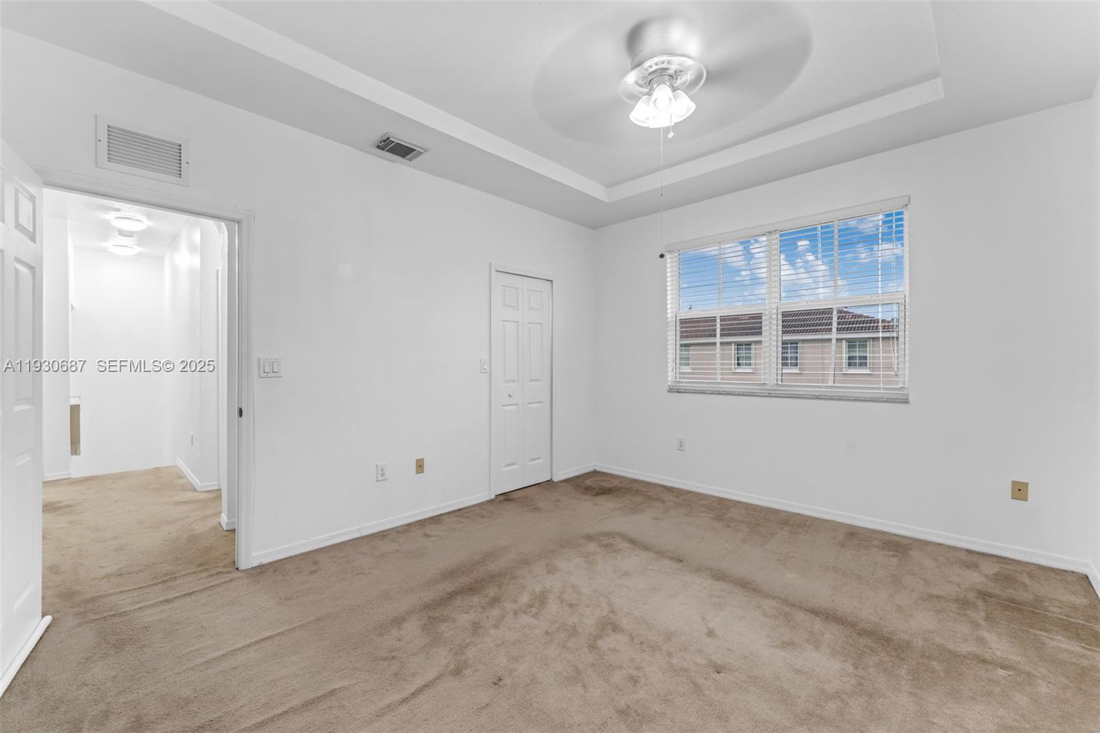 13820 Southwest 275th Street Homestead, FL 33032 - Photo 19 of 36 a view of empty room with windows