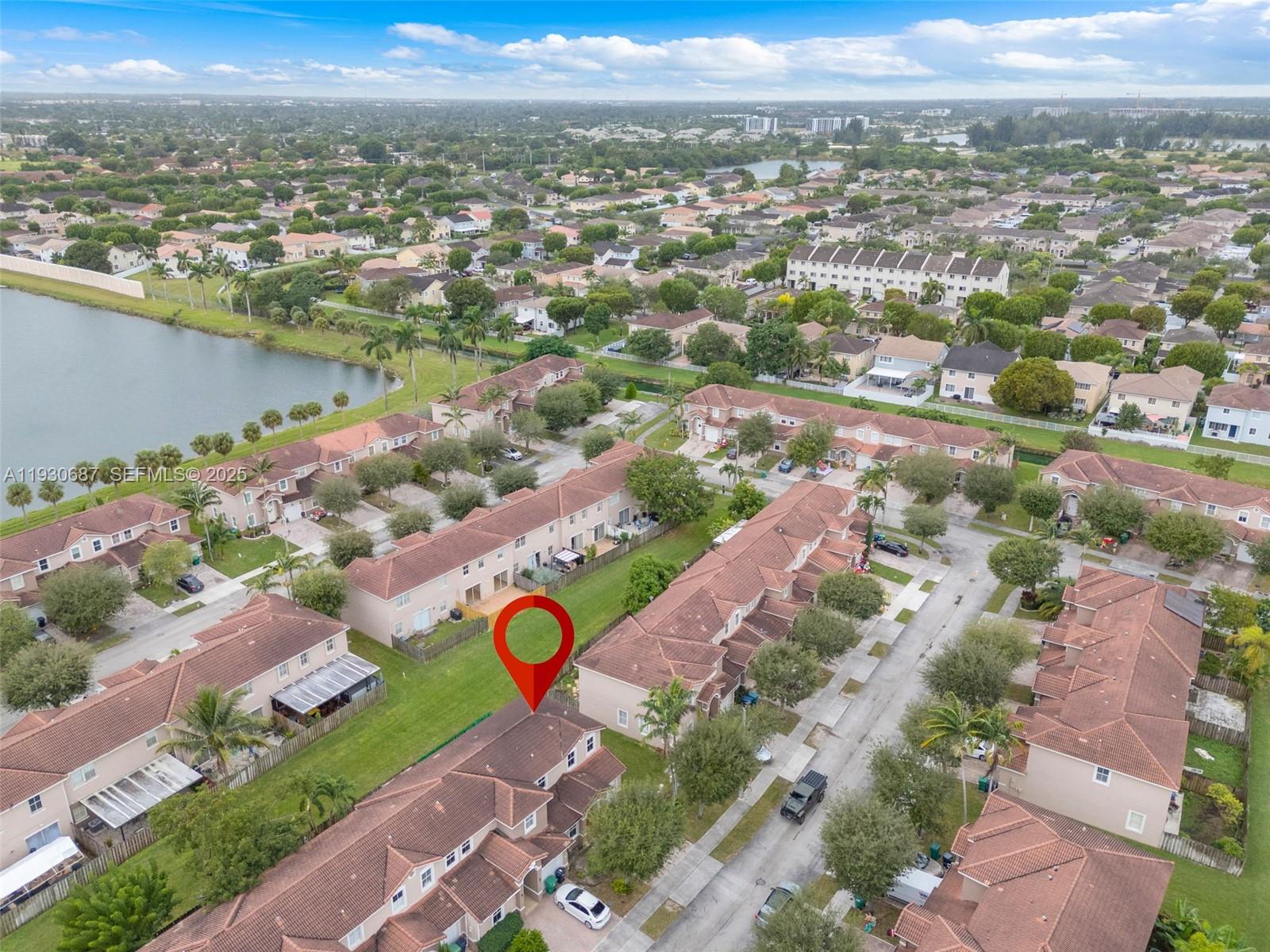 13820 Southwest 275th Street Homestead, FL 33032 - Photo 27 of 36 an aerial view of a city