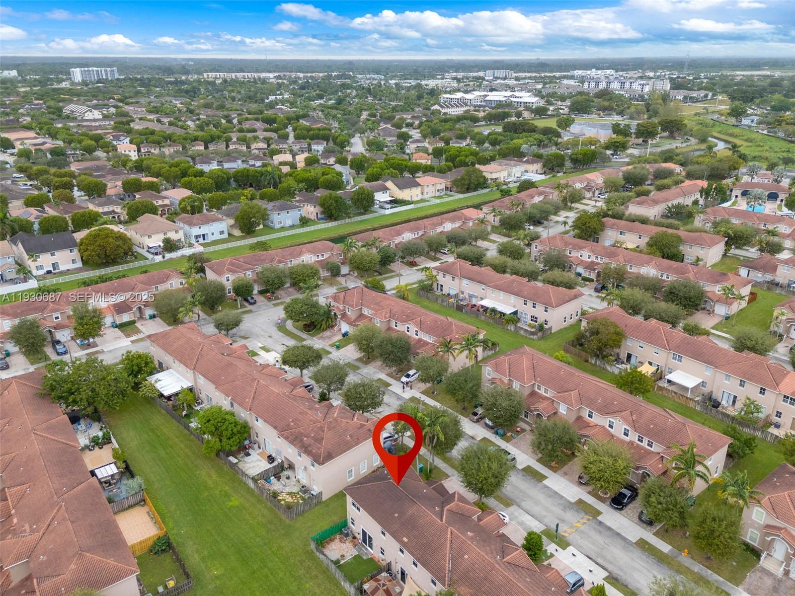 13820 Southwest 275th Street Homestead, FL 33032 - Photo 28 of 36 an aerial view of city and lake