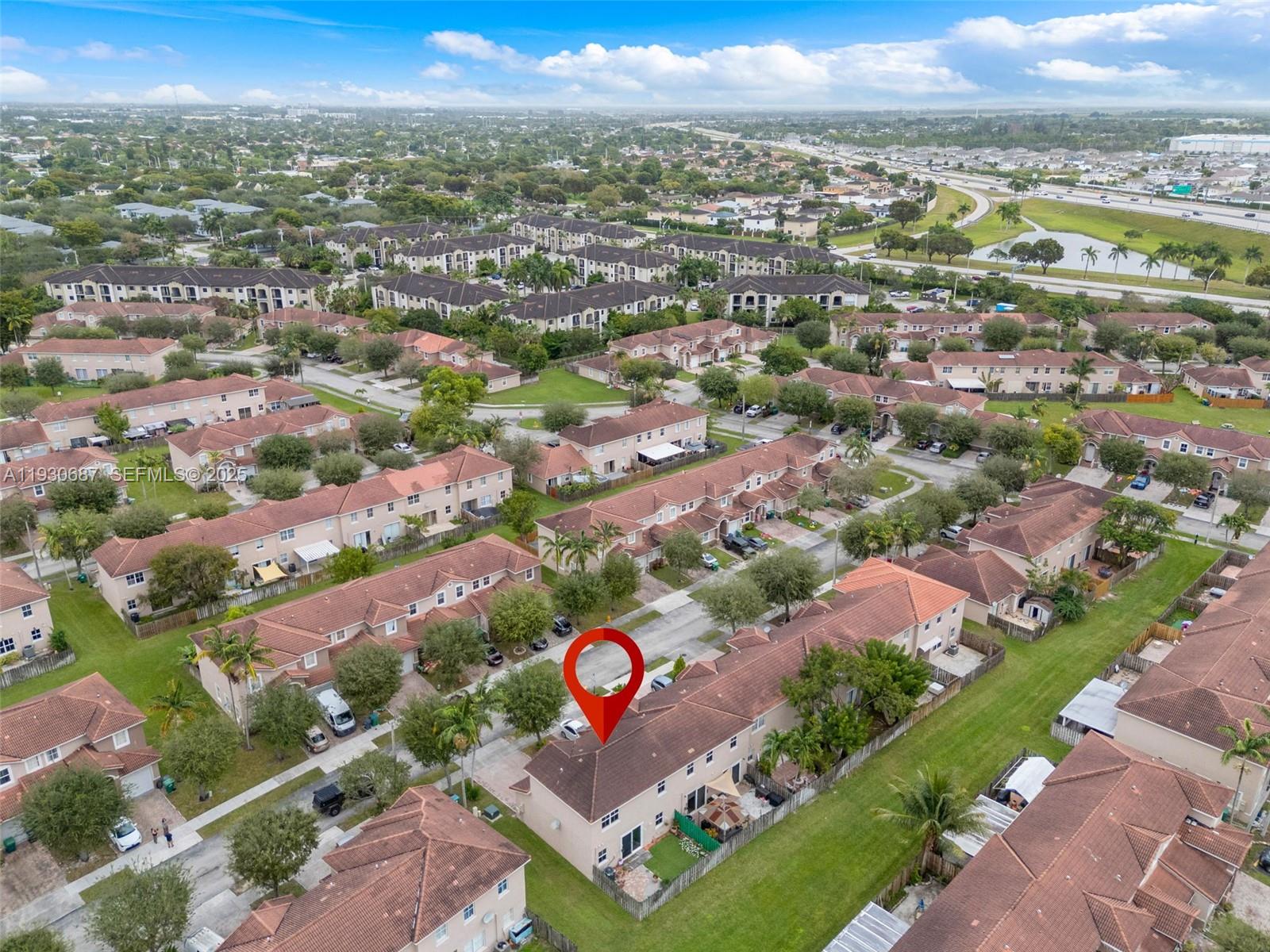 13820 Southwest 275th Street Homestead, FL 33032 - Photo 31 of 36 an aerial view of residential houses with outdoor space