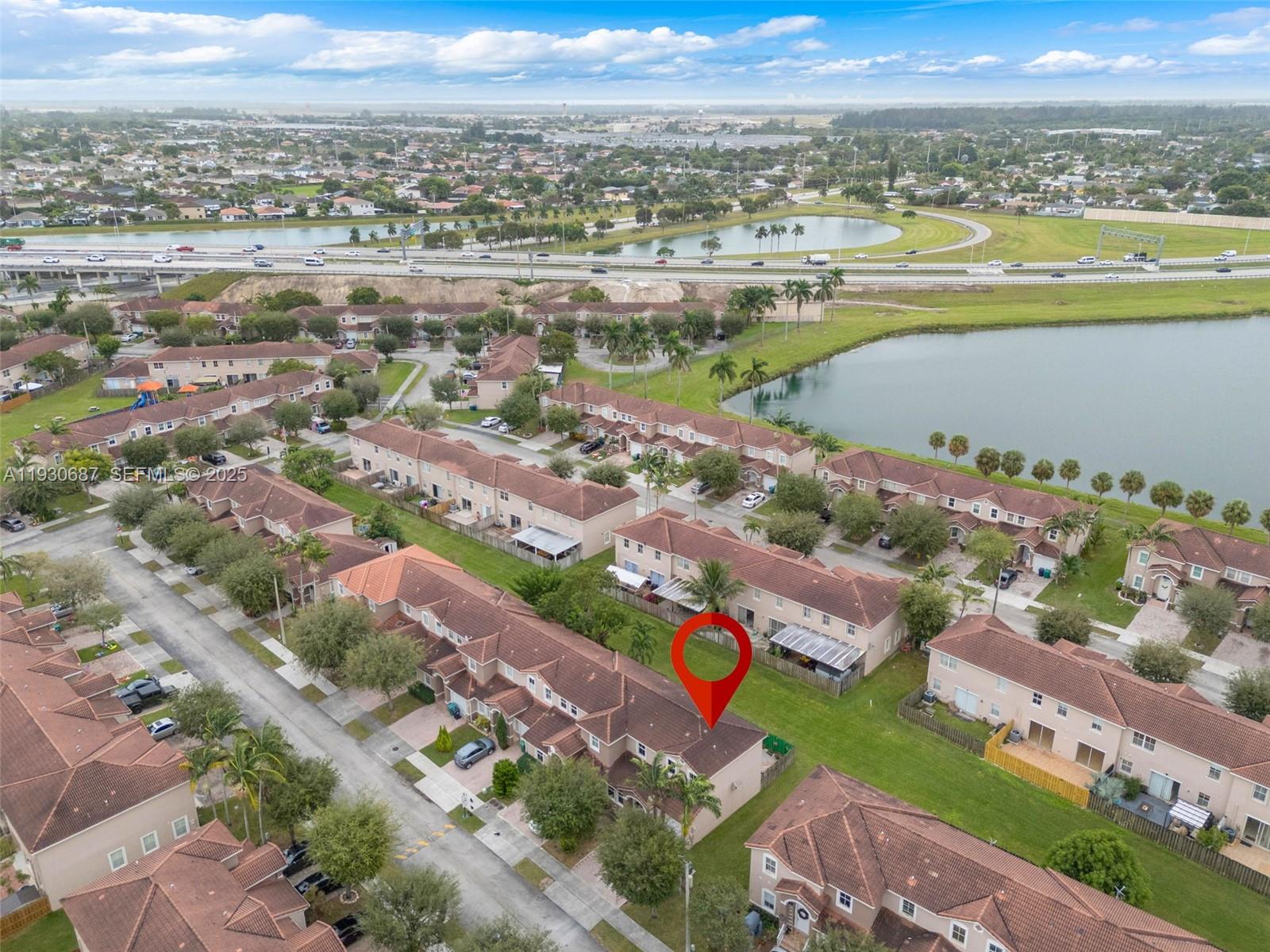 13820 Southwest 275th Street Homestead, FL 33032 - Photo 32 of 36 an aerial view of a city