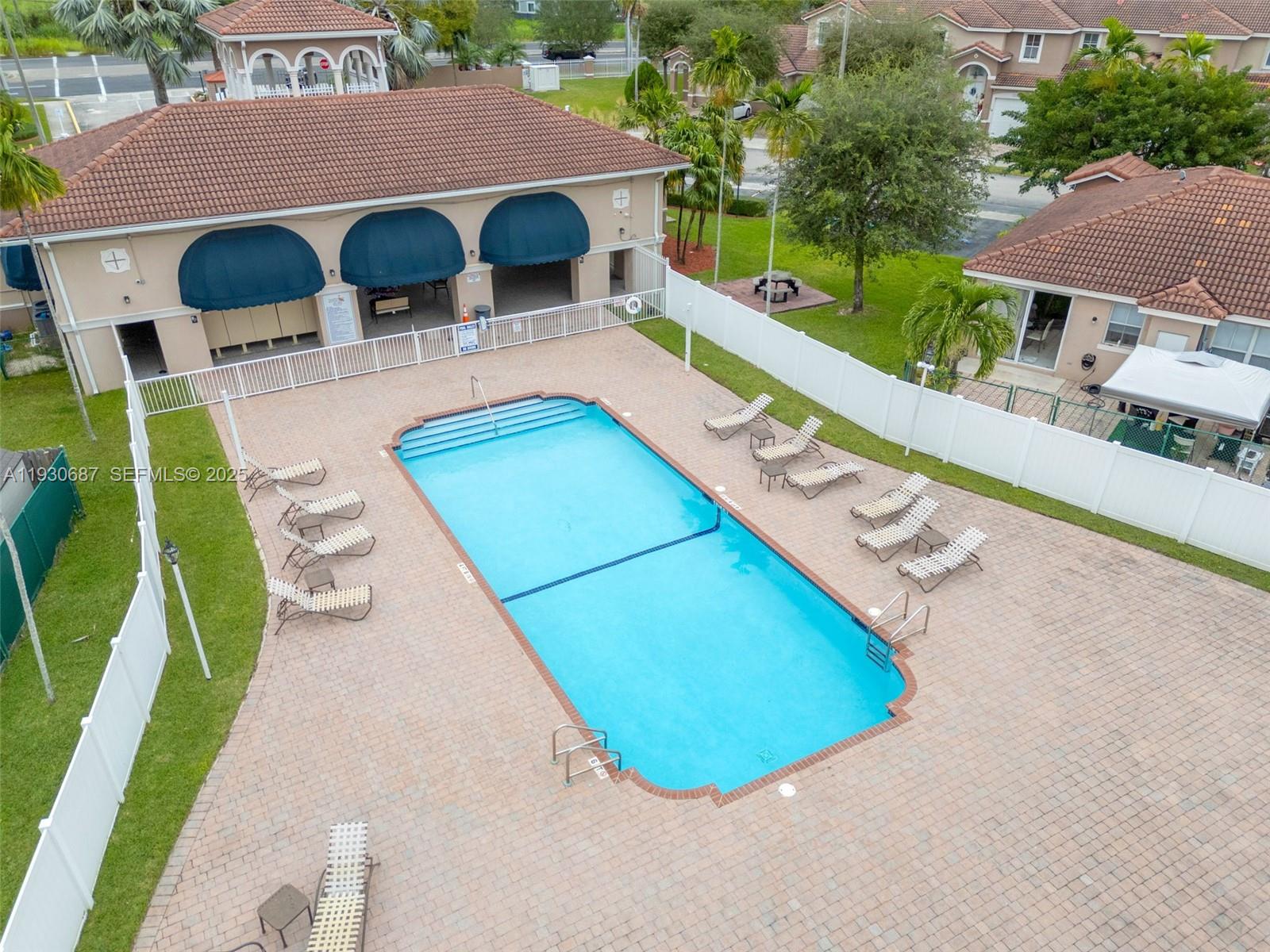13820 Southwest 275th Street Homestead, FL 33032 - Photo 34 of 36 an aerial view of a house with swimming pool and patio