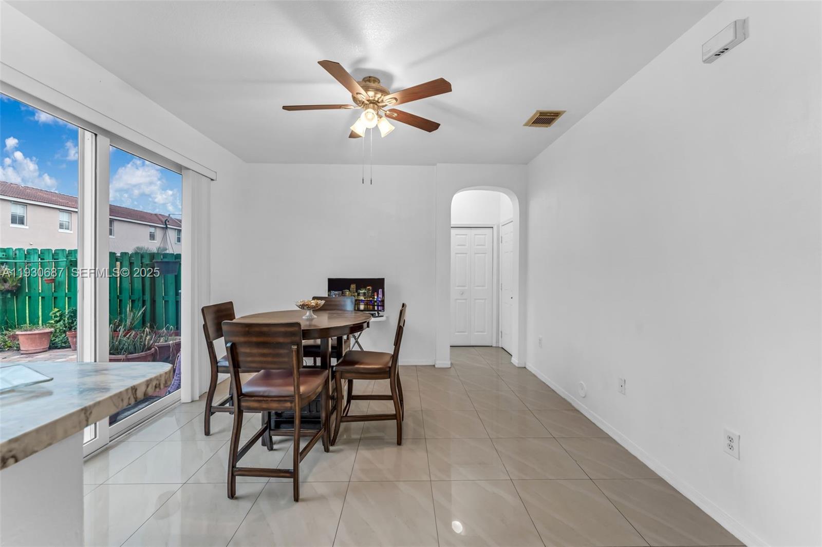 13820 Southwest 275th Street Homestead, FL 33032 - Photo 7 of 36 a view of a dining room with furniture