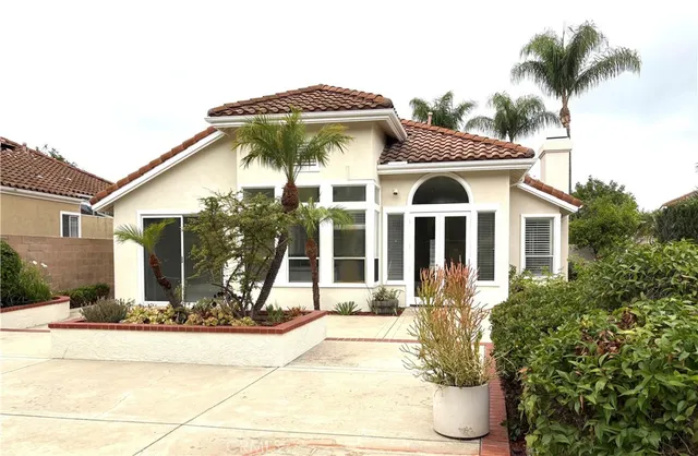 a front view of a house with a porch