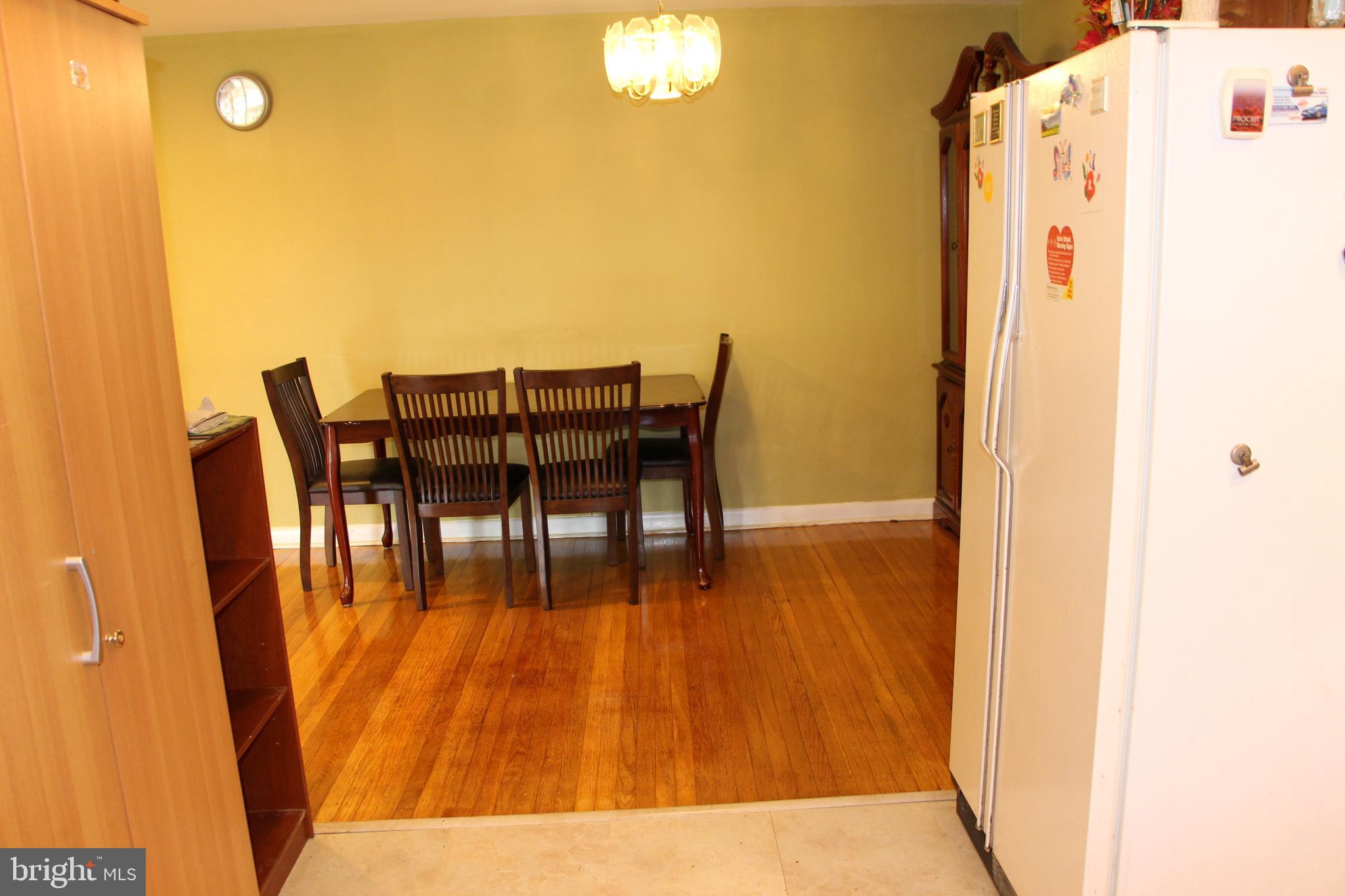 635 Colebrook Road Philadelphia, PA 19115 - Photo 11 of 31 a dining room with furniture and wooden floor