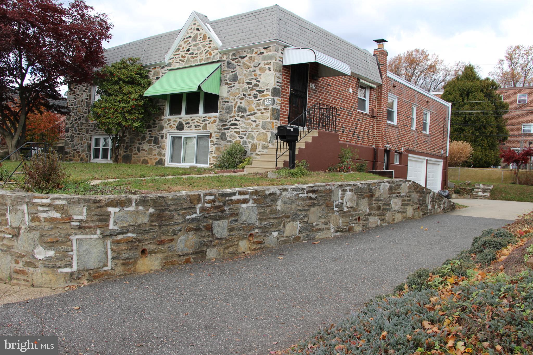 635 Colebrook Road Philadelphia, PA 19115 - Photo 3 of 31 a view of a house with a yard