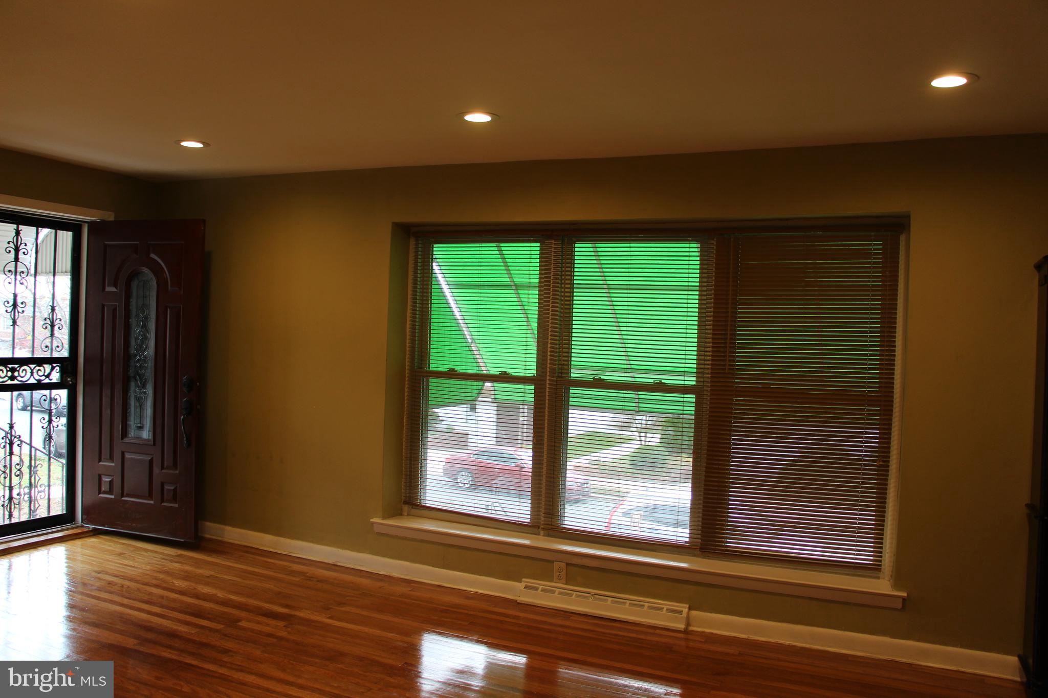635 Colebrook Road Philadelphia, PA 19115 - Photo 6 of 31 a view of empty room with wooden floor and fan