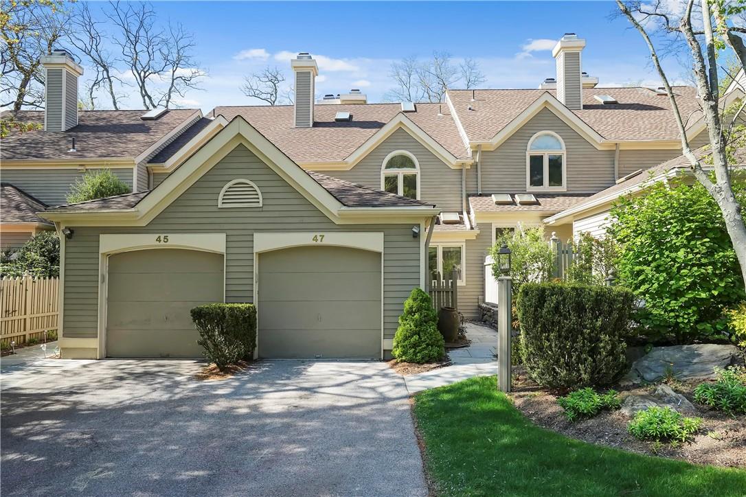 47 Boulder Ridge Road Scarsdale, NY 10583 - Photo 1 of 1 a view of a white house next to a yard and trees