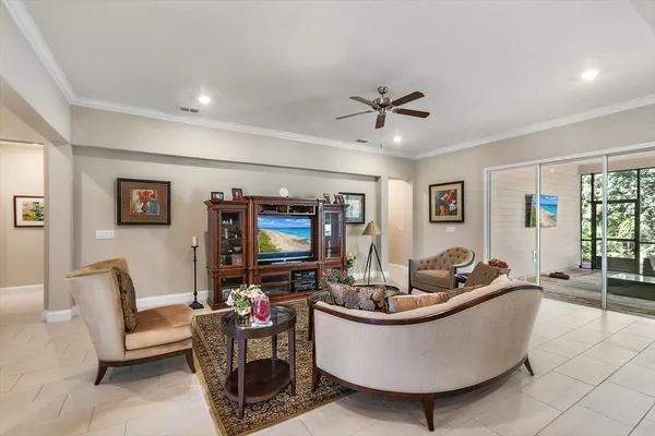 a view of a livingroom with furniture and windows