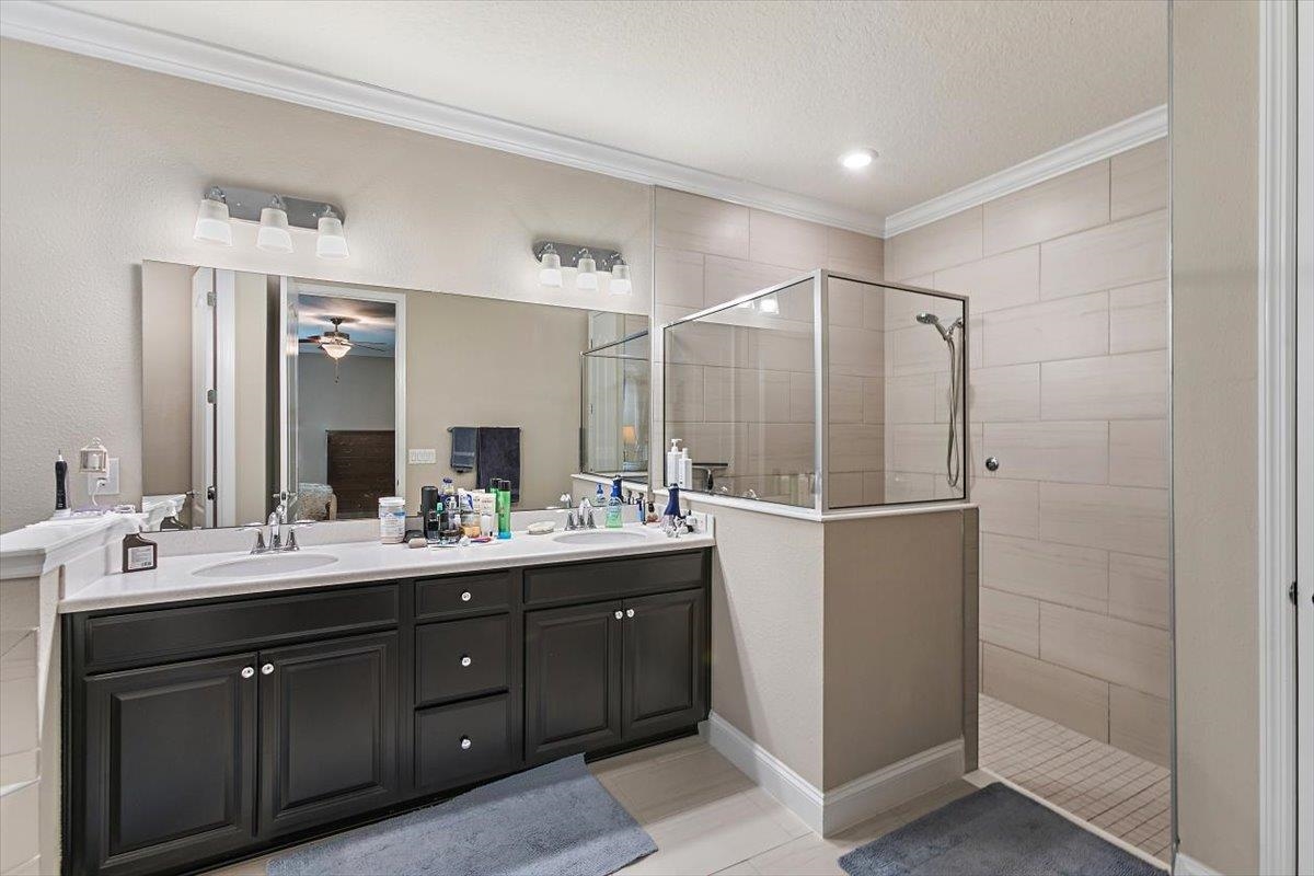 2996 Las Calinas Boulevard St. Augustine, FL 32095 - Photo 15 of 31 a bathroom with a double vanity sink mirror and double