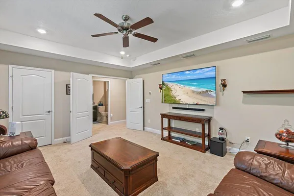 a living room with furniture and a window