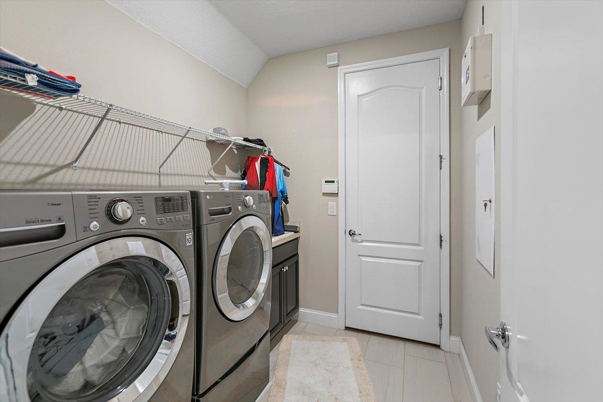 2996 Las Calinas Boulevard St. Augustine, FL 32095 - Photo 25 of 31 a utility room with dryer and washer