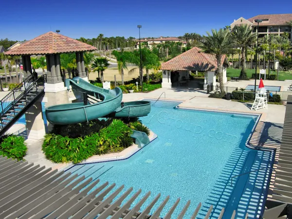 a view of a swimming pool with an ocean view