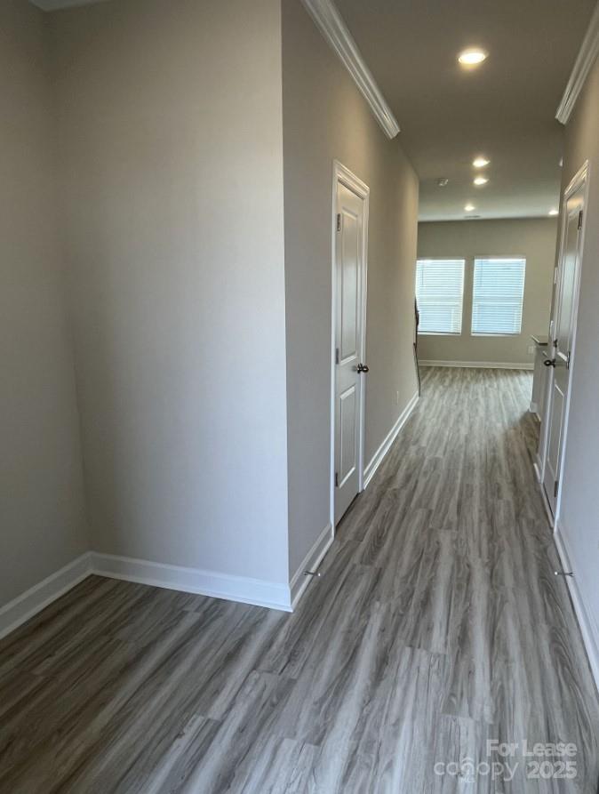 3703 Backwater Street Concord, NC 28027 - Photo 2 of 23 a view of hallway with wooden floor
