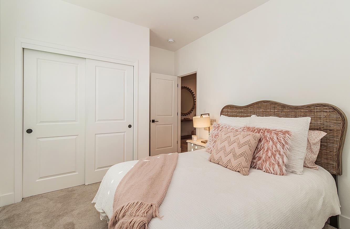 4593 Orchard Hills Road Madera, CA 93636 - Photo 4 of 25 a bedroom with a bed and a window