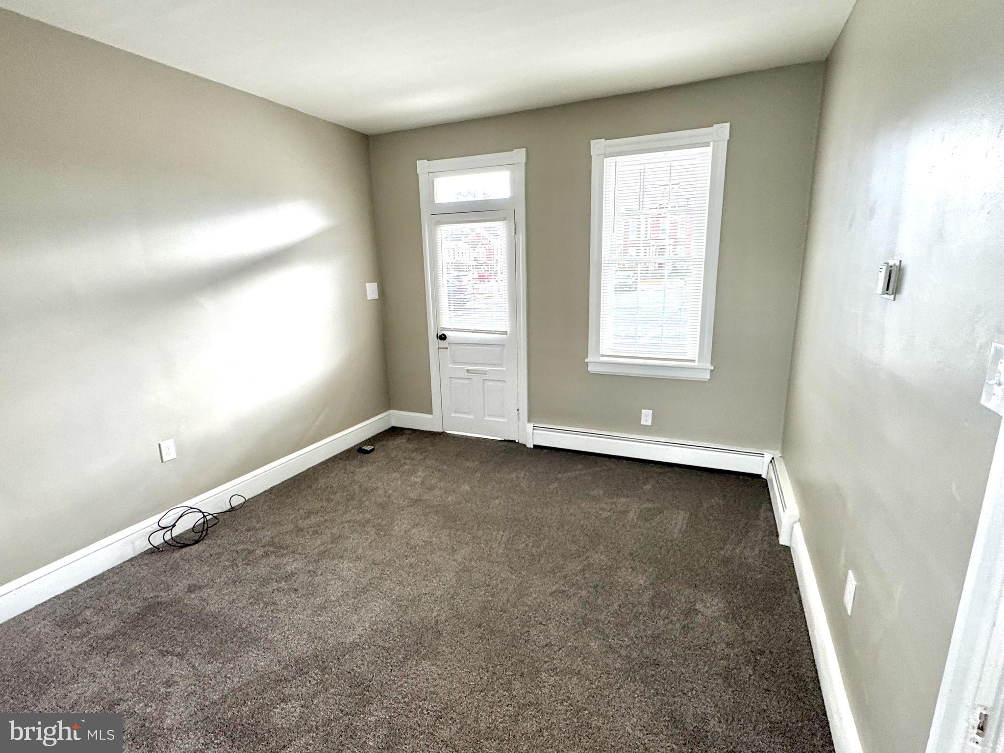 14 West Penn Avenue, Unit 3 Robesonia, PA 19551 - Photo 3 of 13 an empty room with a window