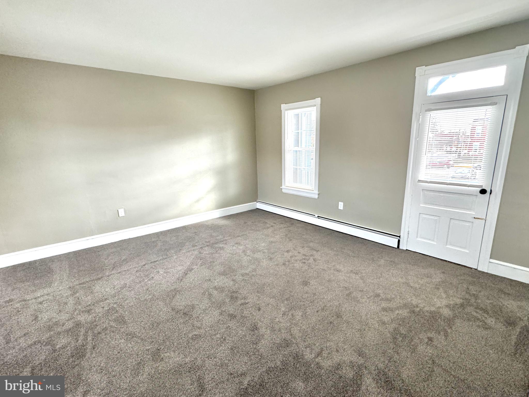 14 West Penn Avenue, Unit 3 Robesonia, PA 19551 - Photo 7 of 13 an empty room with windows