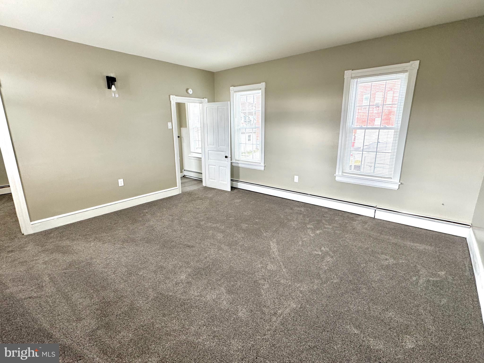 14 West Penn Avenue, Unit 3 Robesonia, PA 19551 - Photo 8 of 13 a view of an empty room with a window