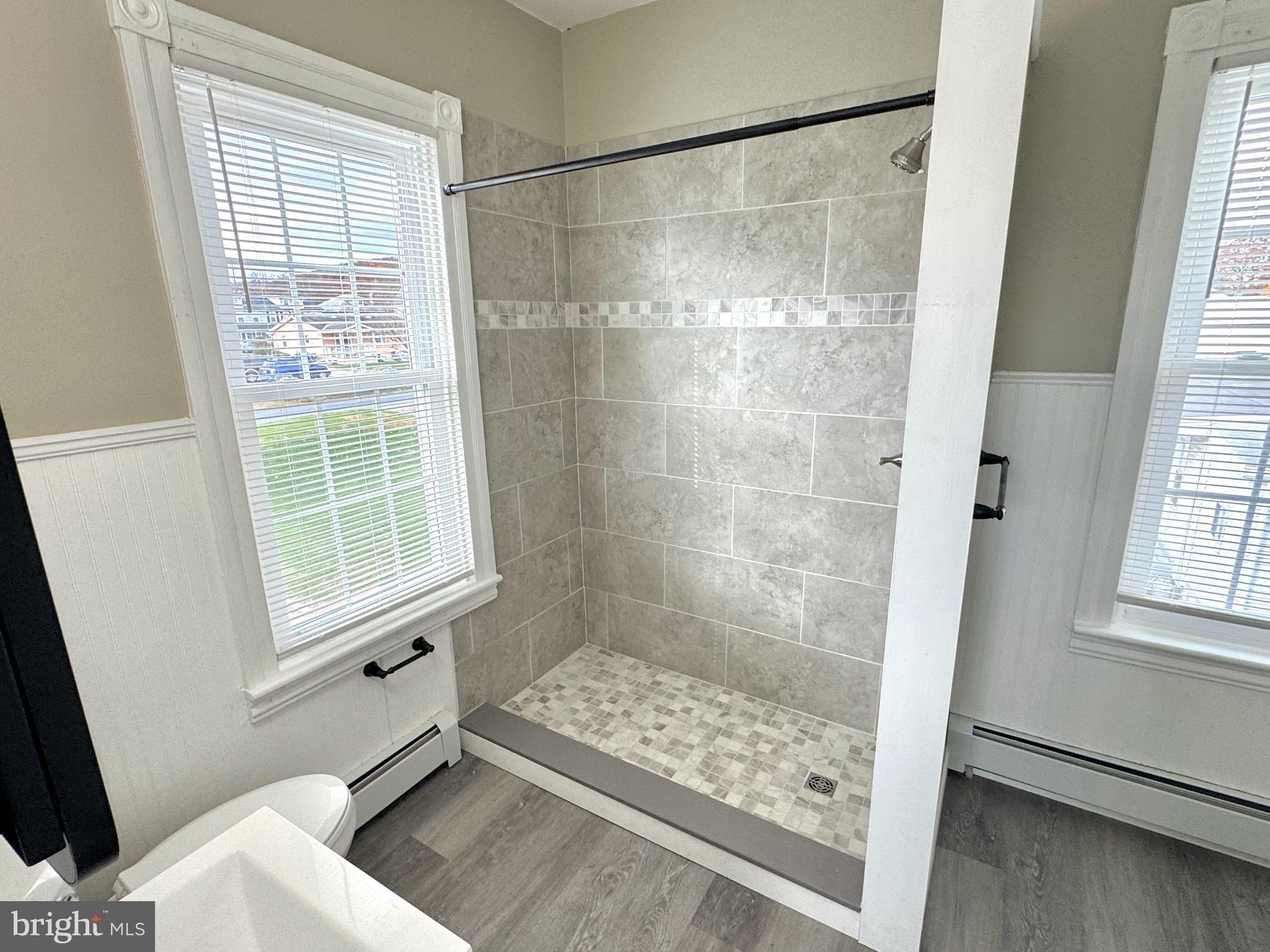 14 West Penn Avenue, Unit 3 Robesonia, PA 19551 - Photo 10 of 13 a bathroom with a bathtub and shower