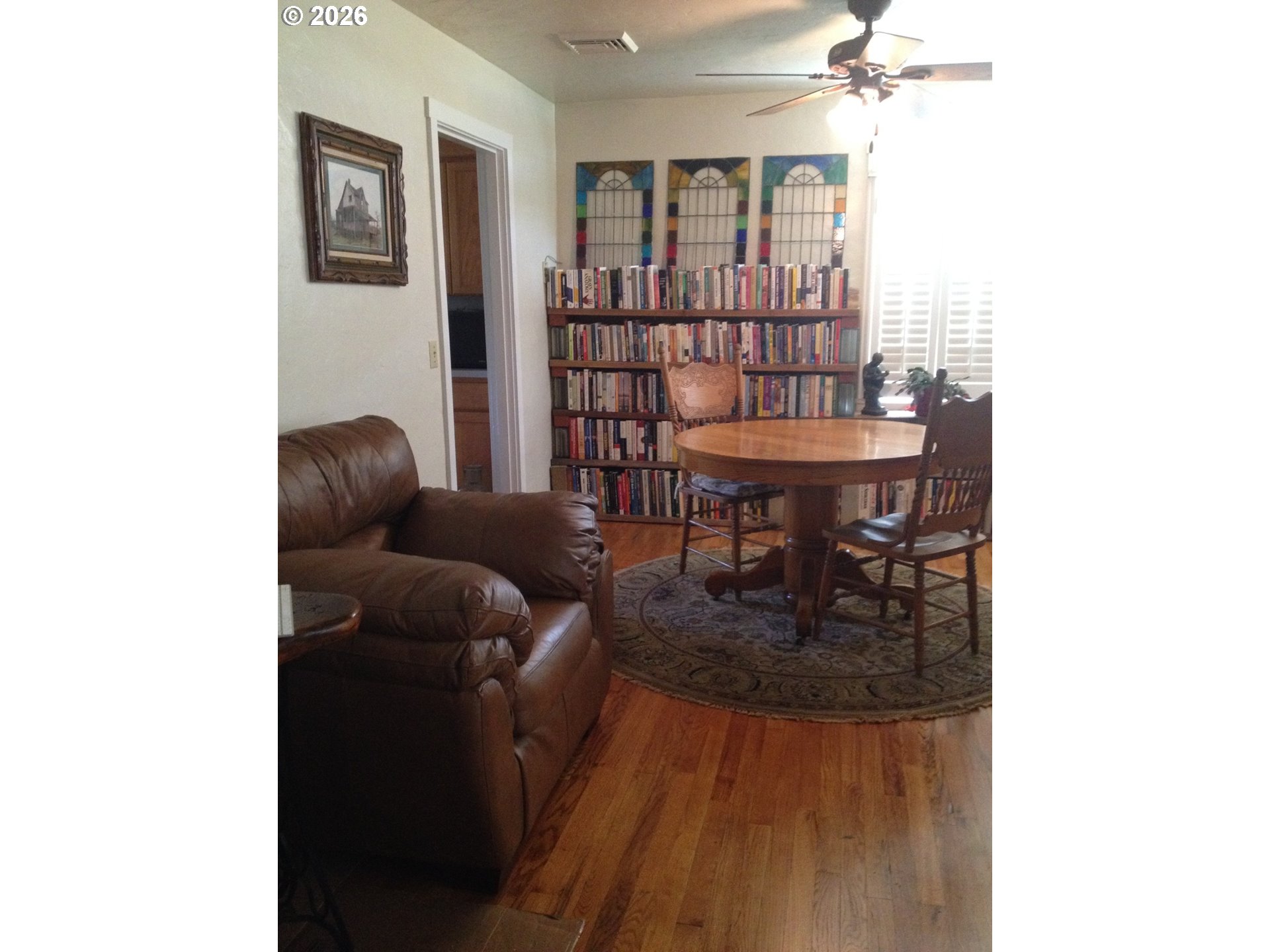 273 Crest Drive Myrtle Creek, OR 97457 - Photo 11 of 28 a living room with furniture and a table