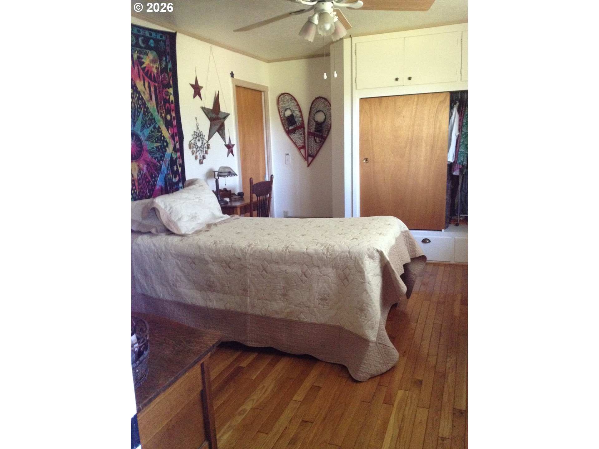 273 Crest Drive Myrtle Creek, OR 97457 - Photo 13 of 28 a bedroom with a bed and a mirror