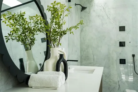 a view of entryway and hall with dining area