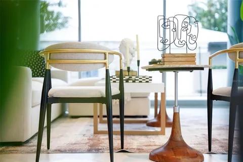 a kitchen with stainless steel appliances kitchen island a large counter top