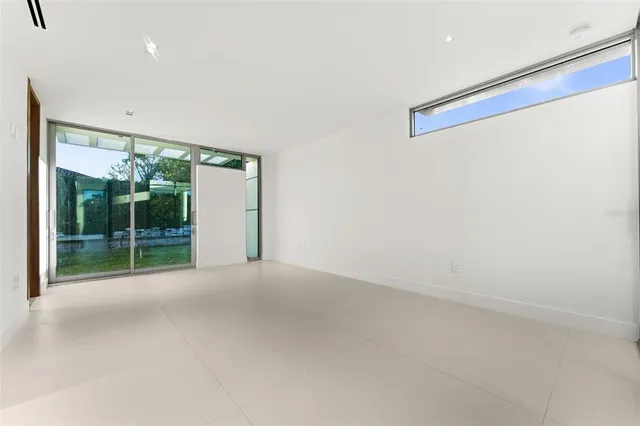 a bathroom with a sink a shower and a mirror