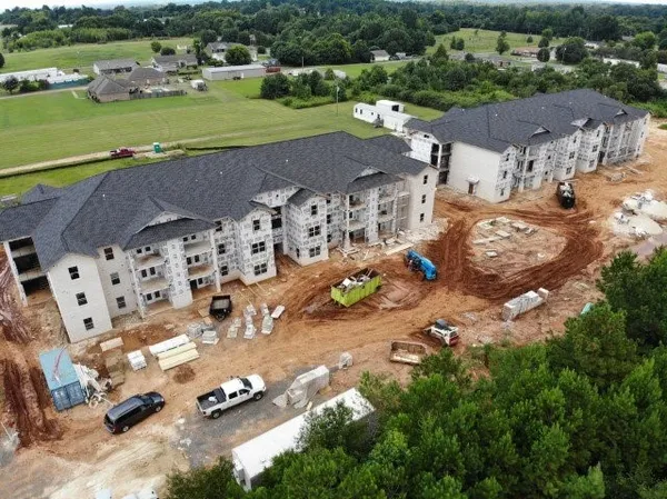 an aerial view of a house with a garden