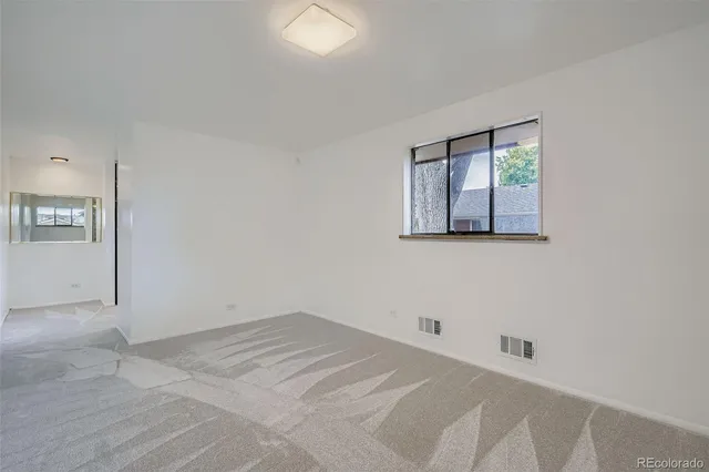 a view of a room with a window