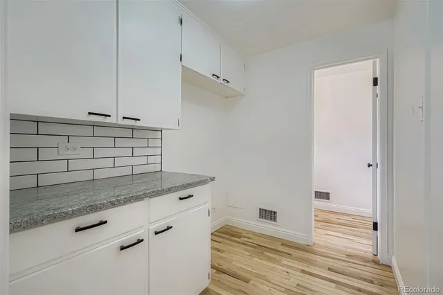 a view of a storage and utility room